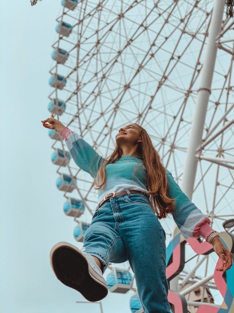 A girl in the amusement park