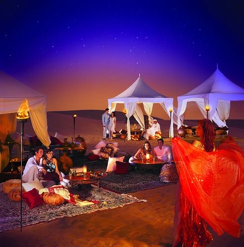 A party in the deserts of Dubai at night